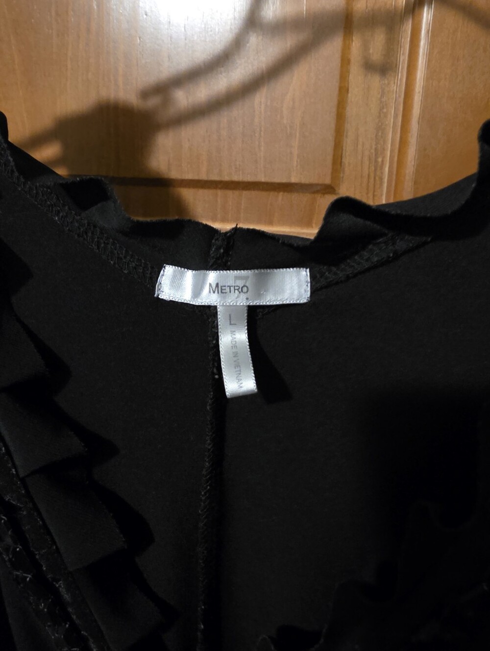 Elegant Black Sleeveless V-Necki Dress with Sequin Trim - Picture 3 of 4